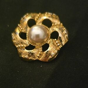 Elegant Gold Flower Brooch with Pearl Center